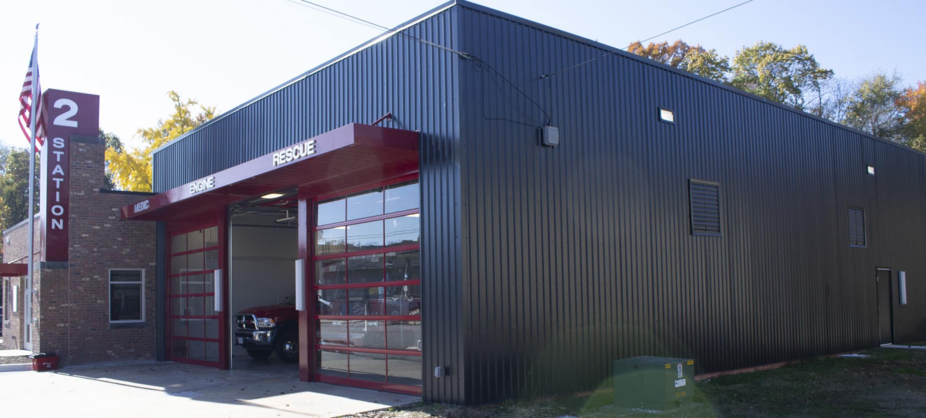 Firehouse Building with M-Loc metal siding in black
