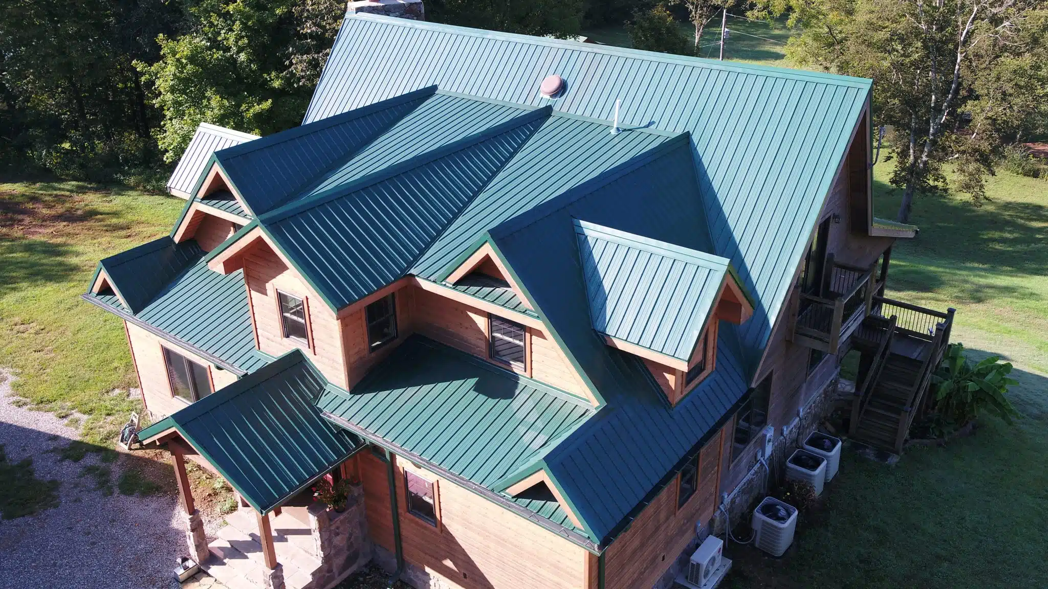 Residential Home with Metal Roof in Forest Green