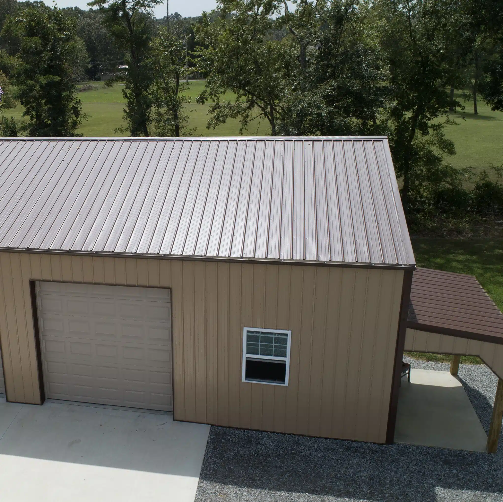 post frame metal building with Panel-Loc brown roof and tan walls