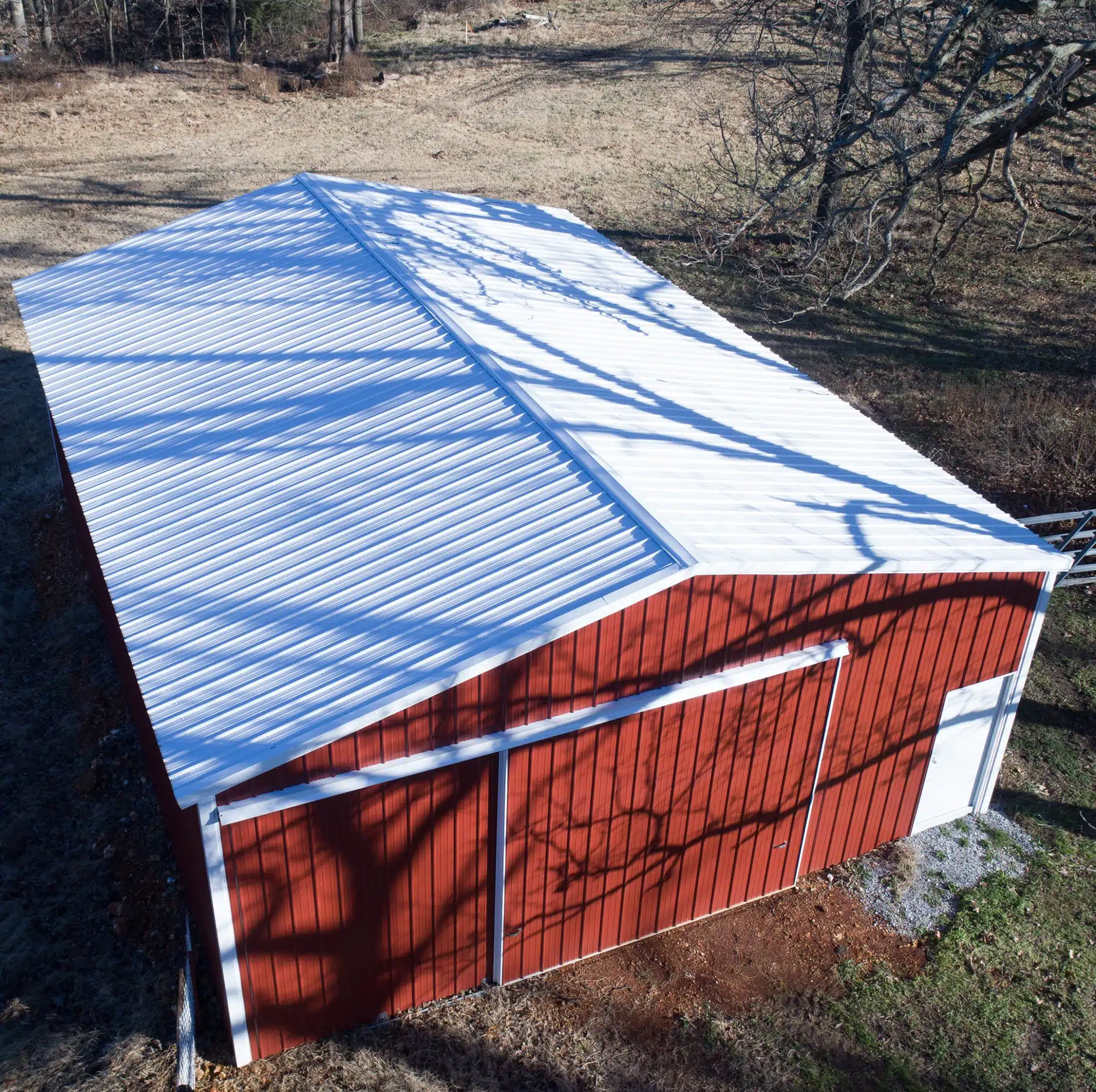 Metal Barn with Panel-Loc Rustic Red Walls and Brilliant White Roof