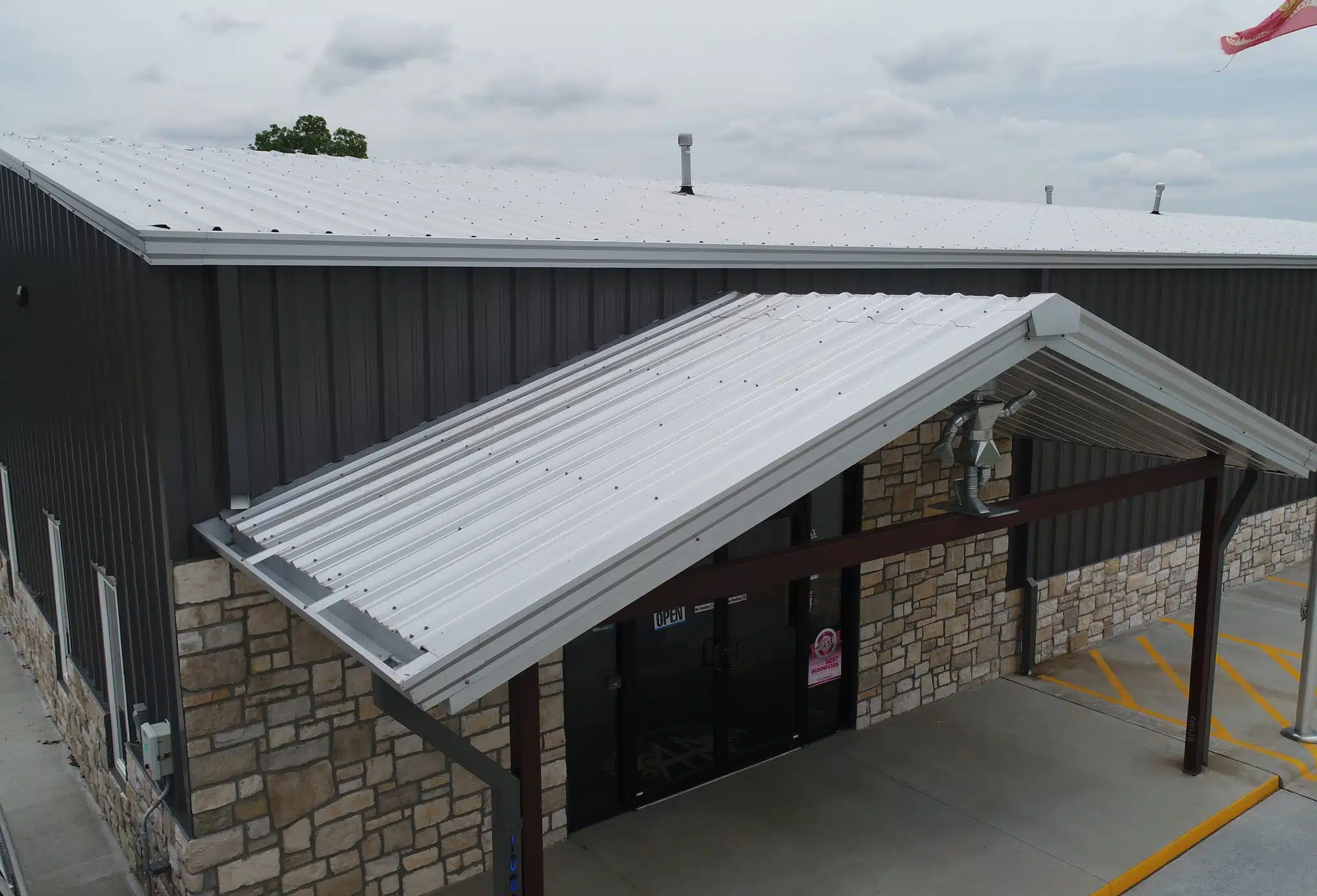 Galvanized R-Loc Metal Roof and Charcoal Walls