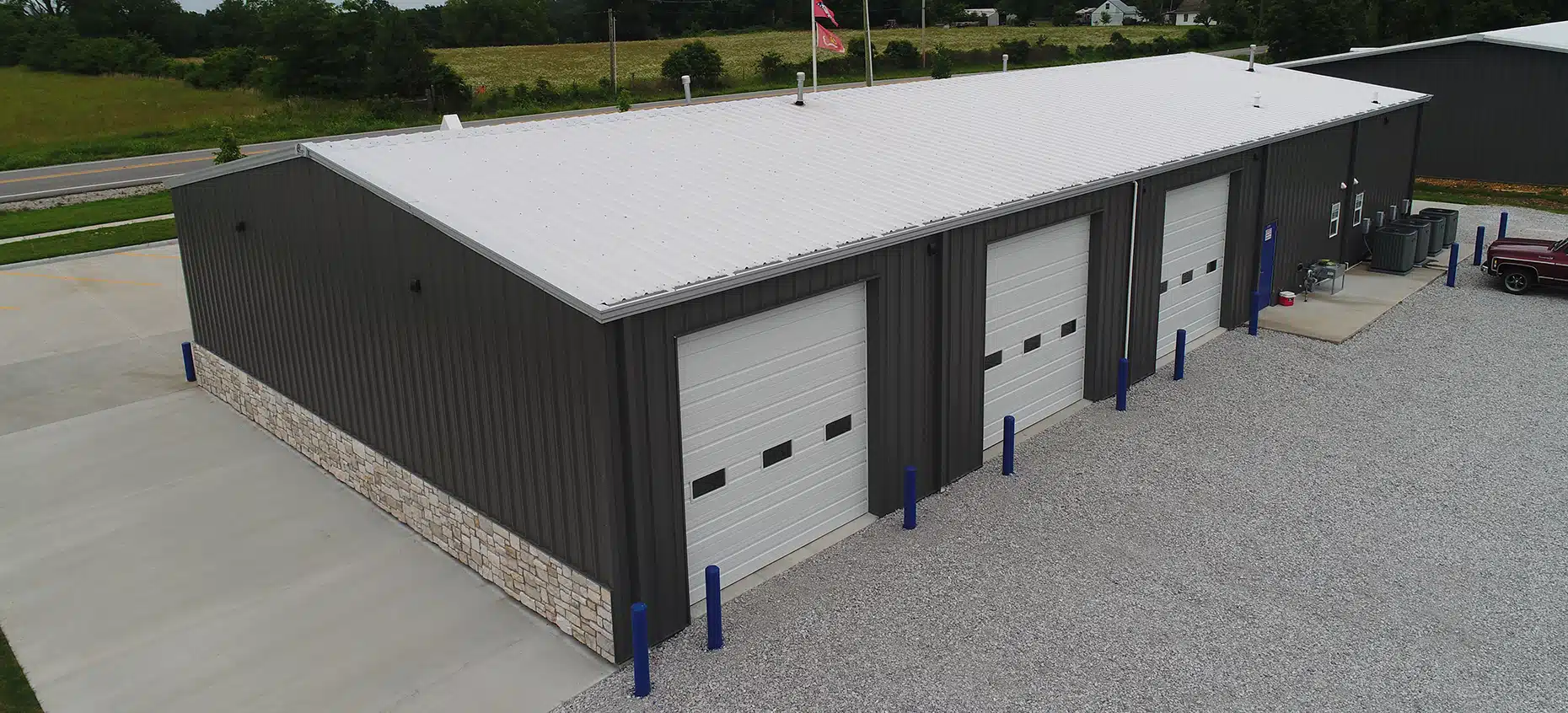 Custom Metal Building using Commercial Metal Panels with Galvanized Roof and Charcoal Walls