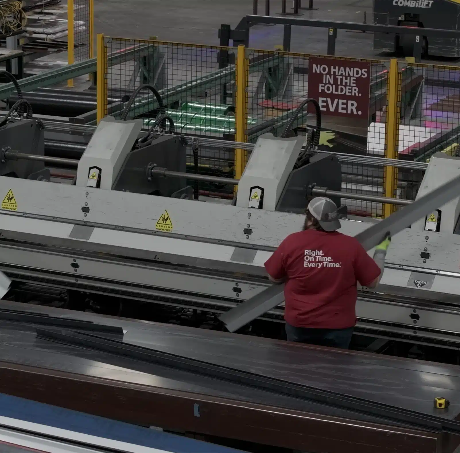 Central States Employee working on Trim Machine in Manufacturing plant