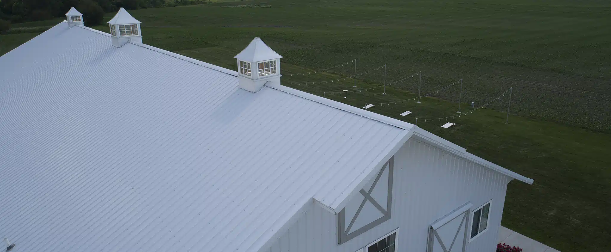 Wedding venue building with white metal roof