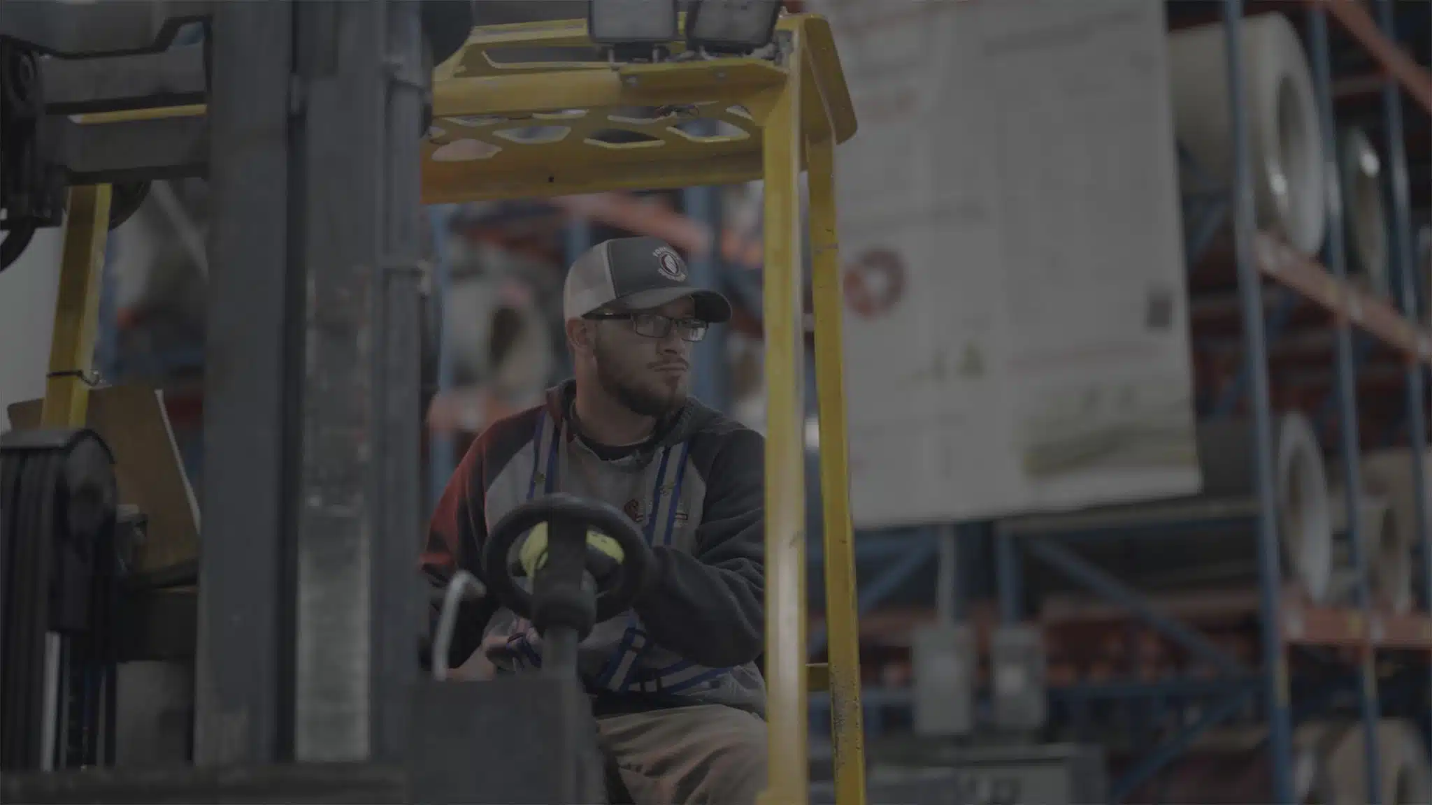 man driving a forklift