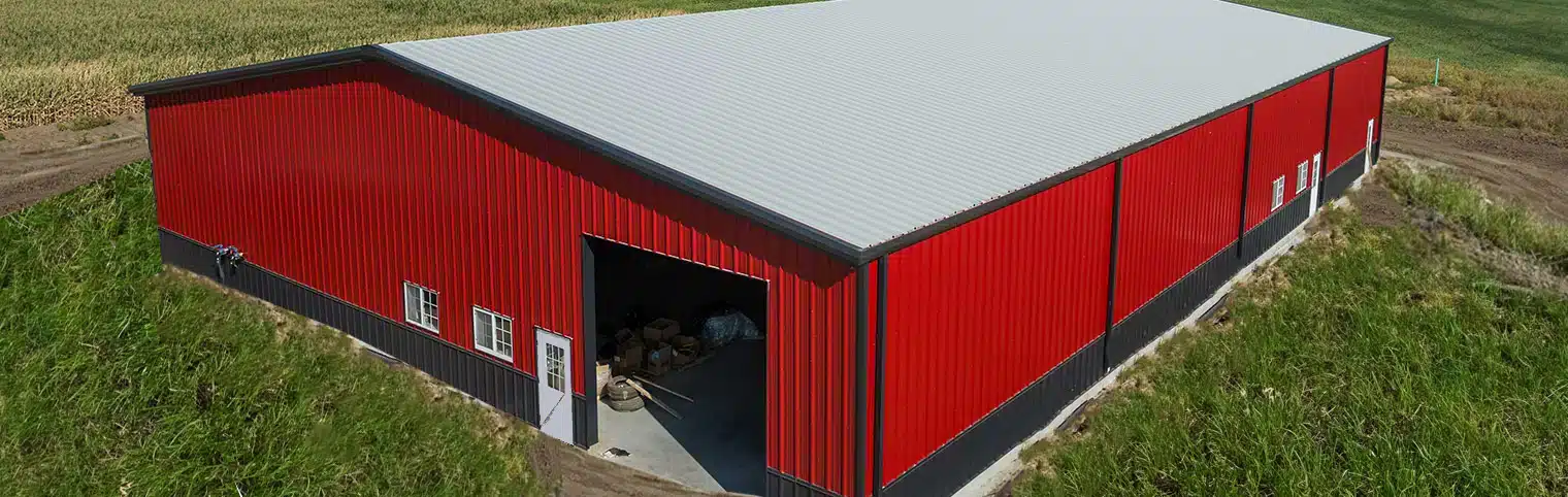 red metal barn in a agricultural setting