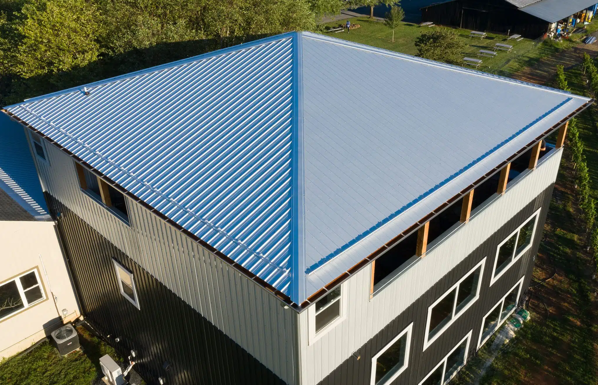 Panel-Loc Plus Metal Panels, Black Walls, Galvanized Roof, on Commercial Winery Building