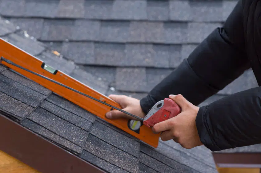 Measuring and checking the slope of a roof