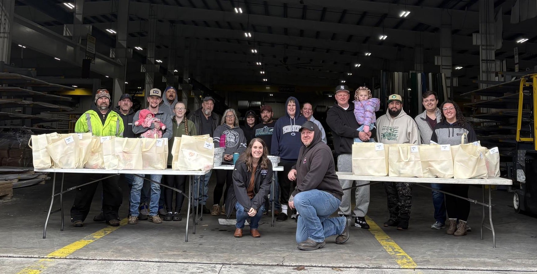 Employees at a Food Giving back Event 2025